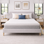 Bedroom with a bed featuring a gray mattress and white bedding, flanked by two nightstands.